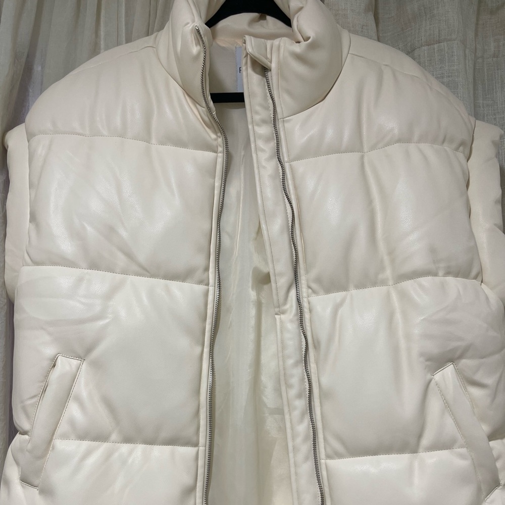 New, never used sleeveless vest